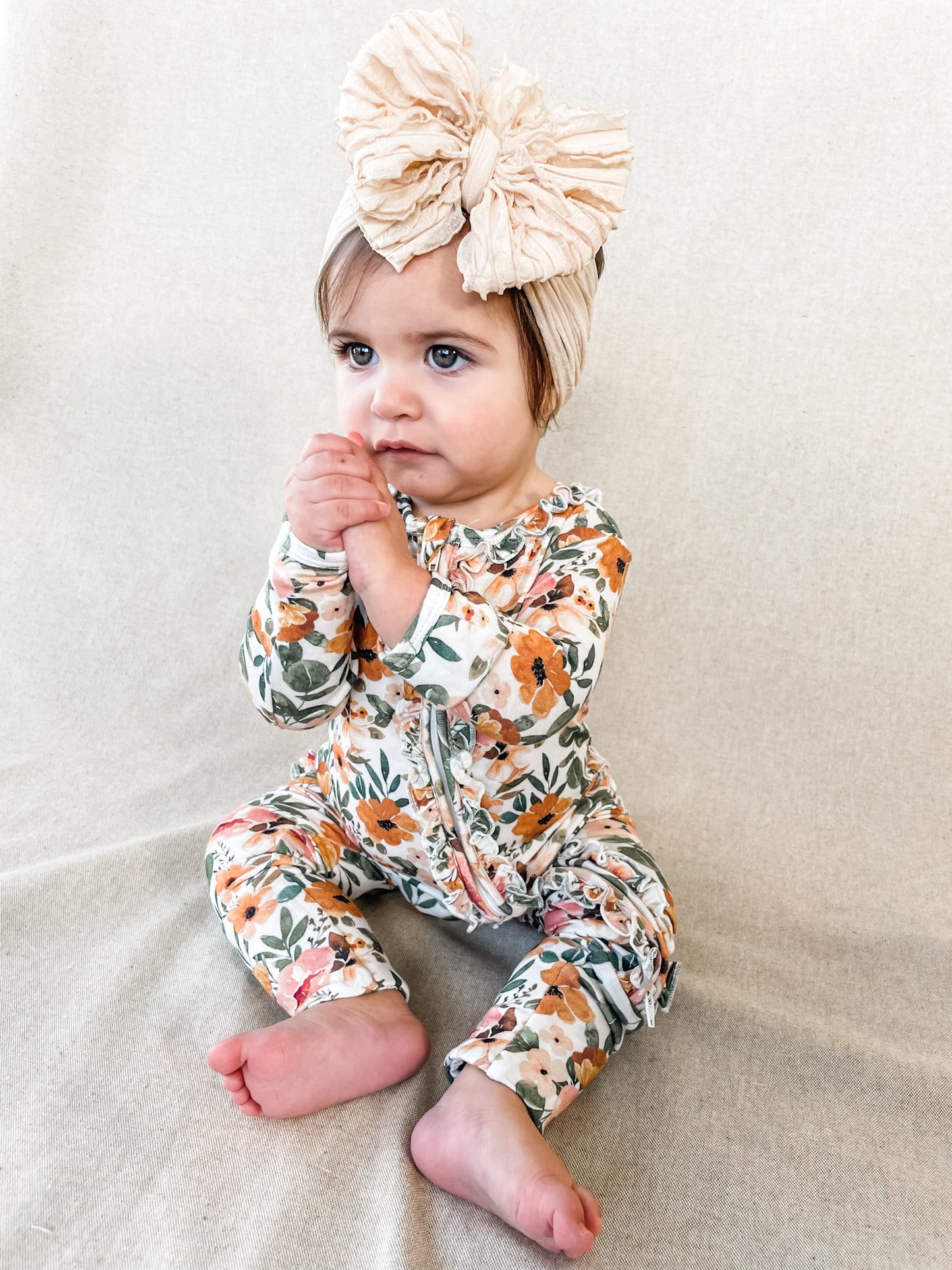 Merigold Ruffle Zipper Footie